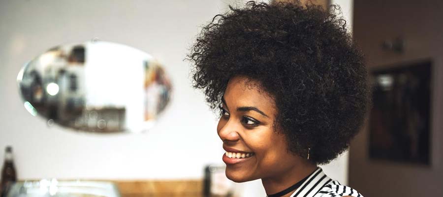 How do you manage natural curly black hair?